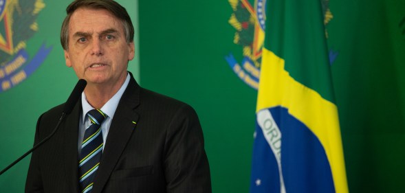 Brazilian President Jair Bolsonaro speaks with press after meeting with venezuelan opposition leader and self-declared iterim president Juan Guaido at Palace Itamaraty on February 28, 2019 in Brasília, Brazil