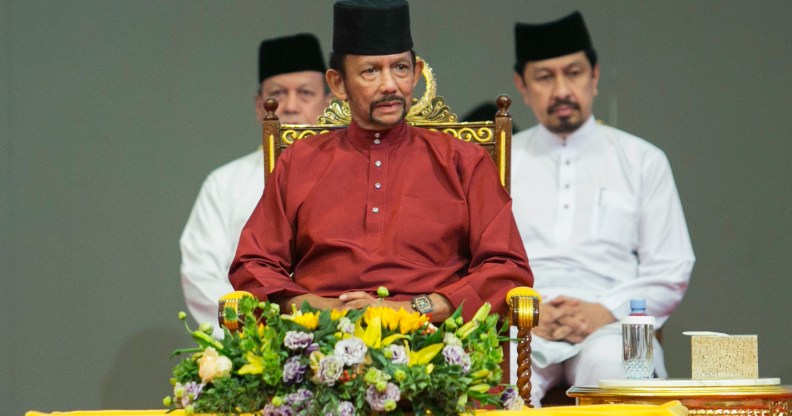 Brunei's Sultan Hassanal Bolkiah (C) attends an event in Bandar Seri Begawan on April 3, 2019.