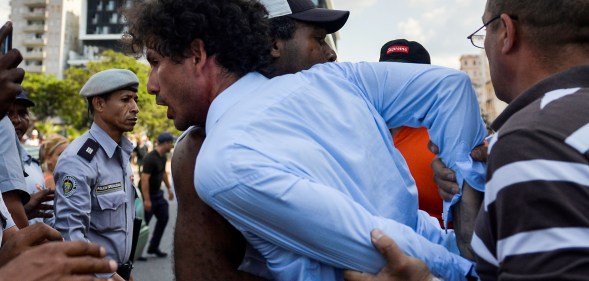 Cuban police arrest demonstrators taking part in the LGBT+ march in Havana, on May 11, 2019.