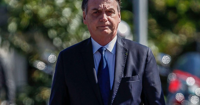 Brazilian President Jair Bolsonaro walks during a ceremony to mark the Army Day, in Sao Paulo, Brazil, on April 18, 2019.