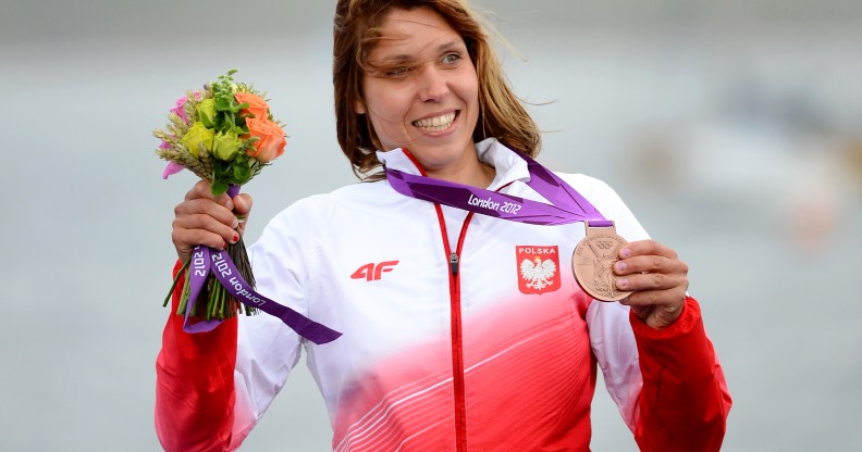 Poland's Zofia Klepacka celebrates her bronze medal on the podium.