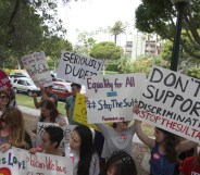 Demonstrators protest the punishment of women and LGBT people announced by the Sultan of Brunei near the Beverly Hills Hotel, which is owned by the Sultan, in Beverly Hills, California