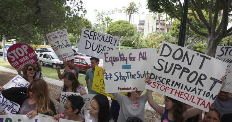 Demonstrators protest the punishment of women and LGBT people announced by the Sultan of Brunei near the Beverly Hills Hotel, which is owned by the Sultan, in Beverly Hills, California