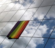 A rainbow flag is displayed on the building of European Council Office.