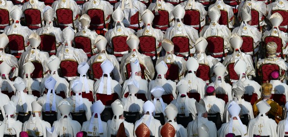 Vatican bishops and cardinals who, according to a new book, are for the most part gay, attend mass.