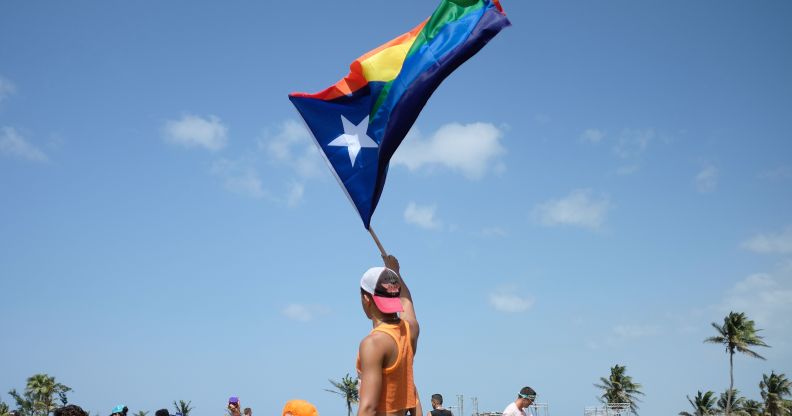 People take part in the annual Gay Pride parade in San Juan, Puerto Rico, on June 3, 2018.