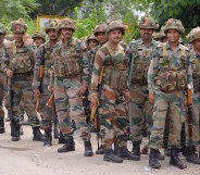 Indian Army personnel stand guard in the Gurdaspur district of Punjab state