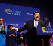 Illinois Democratic candidate for Governor J.B. Pritzker and his Lieutenant Governor pick Juliana Stratton arrive during his primary election night victory speech on March 20, 2018 in Chicago, Illinois.