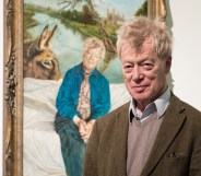 Tory housing tsar Sir Roger Scruton poses next to his portrai