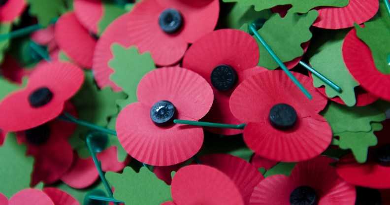 A pile of the iconic red emblem of the British Legion's annual poppy appeal sits on a work bench at the company headquarters in Richmond, London on November 7, 2012 in London, England.