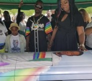 Nigel Shelby buried in rainbow casket.