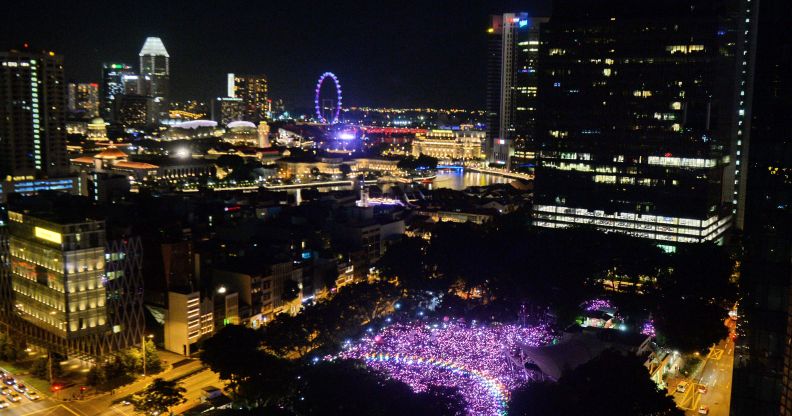 Supporters form a rainbow among lights at the annual Pink Dot event in a public show of support for the LGBT community at Hong Lim Park in Singapore on July 1, 2017.