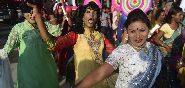 Hijras dance in the street