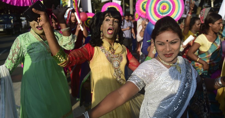 Hijras dance in the street