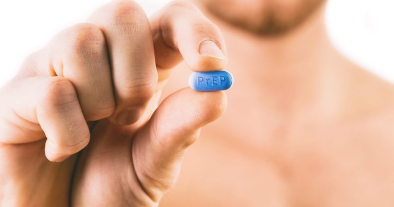 PrEP Impact trial: Man holding a pill used for Pre-Exposure Prophylaxis (PrEP) to prevent HIV infection