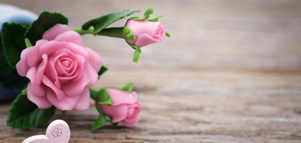 Valentine's Day gifts. Pink rose and heart that says I love you. Valentines Day