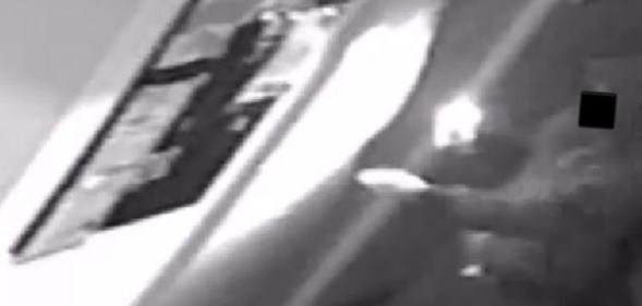 CCTV footage shows a thief entering the Gay Center.