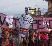 Women holding placards during a rally