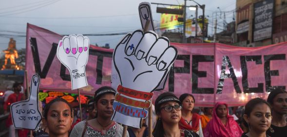 Women holding placards during a rally