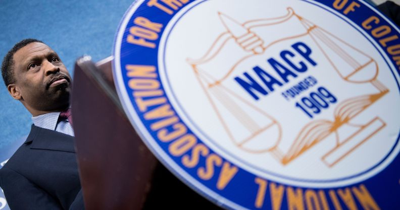 Derrick Johnson, President and CEO of the NAACP, pauses while speaking during a press conference announcing a lawsuit by the NAACP