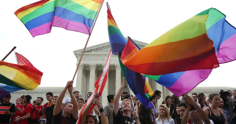 Same-sex marriage supporters rejoice after the U.S Supreme Court hands down a ruling regarding same-sex marriage June 26, 2015 outside the Supreme Court in Washington, DC.