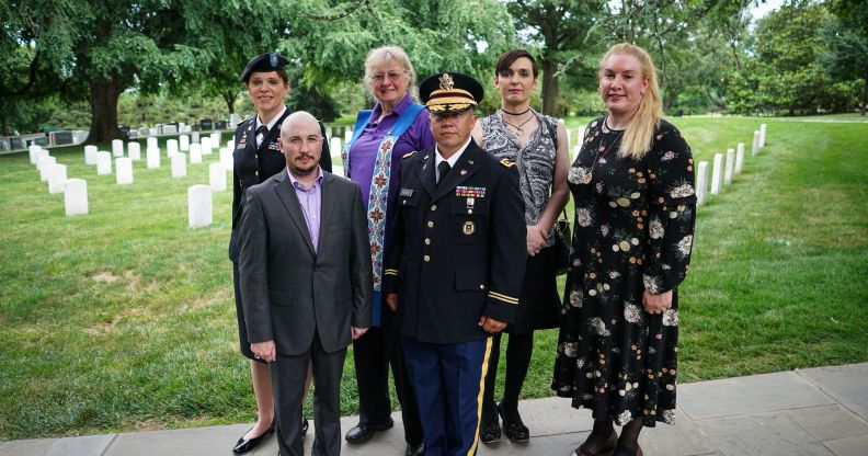 Transgender troops pose for a photo in Arlington National Cemetery, from left: retired Army lieutenant colonel Ann Murdoch, Transgender American Veterans Association Vice President Gene Silvestri, Yvonne Cook-Riley, retired Army major and Transgender American Veterans Association President Evan Young, petty officer first class Alice Ashton and retired Air Force major Nella Ludlow