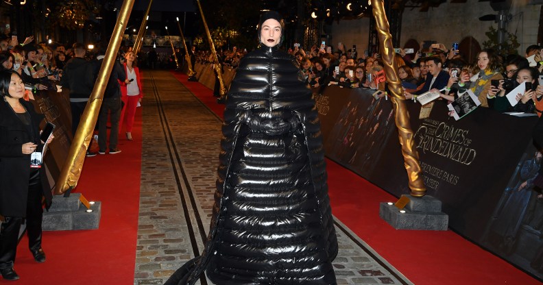 Ezra Miller wears padded gown to Fantastic Beasts premiere