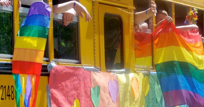 A Gay-Straight Alliance school bus takes part in a Pride parade