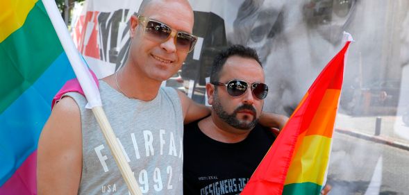 Israeli protesters attend a rally in Tel Aviv on July 22, 2018, to protest against a law on surrogacy parenthood that excludes gay parents.