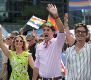 Prime Minister Justin Trudeau, who has approved the design of the new $1 coin, marches at pride.