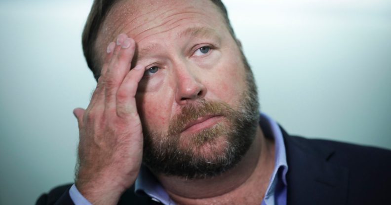 WASHINGTON, DC - SEPTEMBER 5: Alex Jones of InfoWars talks to reporters outside a Senate Intelligence Committee hearing concerning foreign influence operations' use of social media platforms, on Capitol Hill, September 5, 2018 in Washington, DC. Twitter CEO Jack Dorsey and Facebook chief operating officer Sheryl Sandberg faced questions about how foreign operatives use their platforms in attempts to influence and manipulate public opinion. (Photo by Drew Angerer/Getty Images)