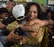 Indian members and supporters of the lesbian, gay, bisexual, transgender (LGBT) community celebrate the Supreme Court decision to strike down a colonial-era ban on gay sex, in Mumbai on September 6, 2018. - India's Supreme Court on September 6 struck down the ban that has been at the centre of years of legal battles. "The law had become a weapon for harassment for the LGBT community," Chief Justice Dipak Misra said as he announced the landmark verdict. (Photo by INDRANIL MUKHERJEE / AFP) (Photo credit should read INDRANIL MUKHERJEE/AFP/Getty Images)