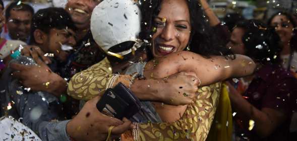 Indian members and supporters of the lesbian, gay, bisexual, transgender (LGBT) community celebrate the Supreme Court decision to strike down a colonial-era ban on gay sex, in Mumbai on September 6, 2018. - India's Supreme Court on September 6 struck down the ban that has been at the centre of years of legal battles. "The law had become a weapon for harassment for the LGBT community," Chief Justice Dipak Misra said as he announced the landmark verdict. (Photo by INDRANIL MUKHERJEE / AFP) (Photo credit should read INDRANIL MUKHERJEE/AFP/Getty Images)