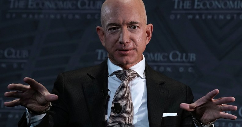 WASHINGTON, DC - SEPTEMBER 13: CEO and founder of Amazon Jeff Bezos participates in a discussion during a Milestone Celebration dinner September 13, 2018 in Washington, DC. Economic Club of Washington celebrated its 32nd anniversary at the event. (Photo by Alex Wong/Getty Images)