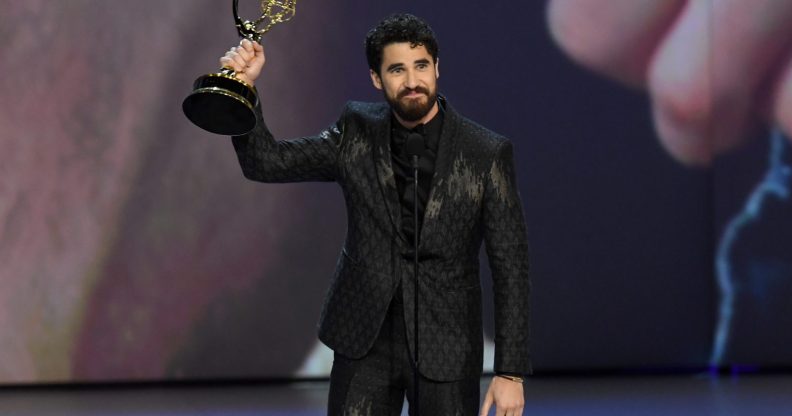 LOS ANGELES, CA - SEPTEMBER 17: Darren Criss accepts the Outstanding Lead Actor in a Limited Series or Movie award for 'The Assassination of Gianni Versace: American Crime Story' onstage during the 70th Emmy Awards at Microsoft Theater on September 17, 2018 in Los Angeles, California. (Photo by Kevin Winter/Getty Images)