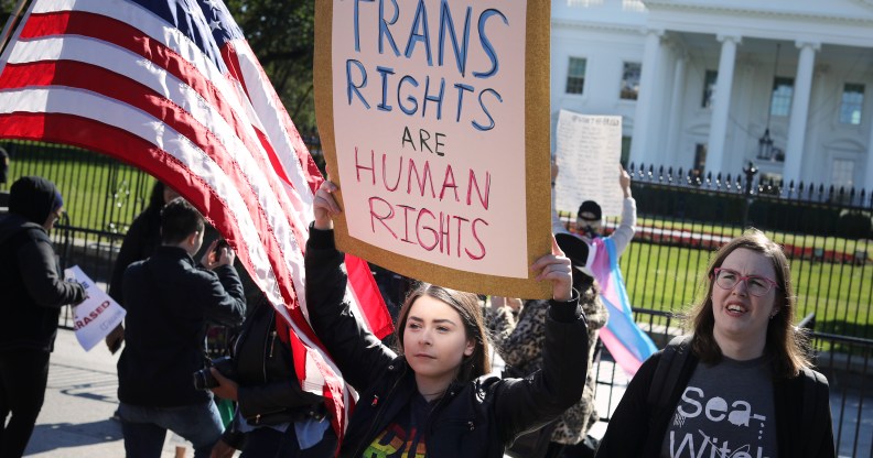 A 'We Will Not Be Erased' rally in front of the White House October 22, 2018, afterthe New York Times published news of an unreleased Trump administration memo that proposes a trans-exclusive legal definition of gender. (Chip Somodevilla/Getty)