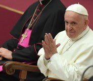 Pope Francis joins his hands during an audience for the participants to the International Meeting of Choirs on November 24, 2018.