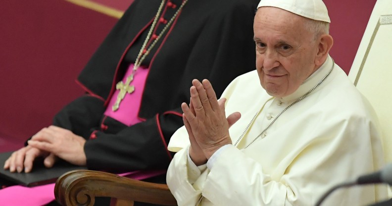 Pope Francis joins his hands during an audience for the participants to the International Meeting of Choirs on November 24, 2018.