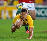 BRISBANE, AUSTRALIA - JUNE 22: Israel Folau of the Wallabies scores a try during the First Test match between the Australian Wallabies and the British & Irish Lions at Suncorp Stadium on June 22, 2013 in Brisbane, Australia. (Photo by Bradley Kanaris/Getty Images)