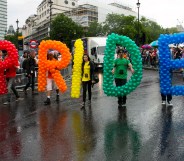 People take part in the Pride in London march in 2014, which celebrates those identifying as part of the LGBT acronym and their allies.