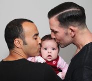 SYDNEY, AUSTRALIA - MAY 30: (L-R) Sydney couple, Faycal Dow, aged 38, daughter Myla Dow, aged 2 months, and Hunter Dow, aged 44, pose during a portrait session on May 30, 2015 in Sydney, Australia. Faycal and Hunter were legally married in France last year and had their first child Myla this year and are supporters of same-sex marriage. " For the sake of our daughter more than anything, it is important that our marriage is recognised as valid in Australia, the country we live in and hope to bring our beautiful daughter up in", said Hunter. The marriage equality debate in Australia has reignited on the back of Ireland's referendum legalising same-sex marriage last week. Recent polls suggest public support for gay marriage in Australia is at an all-time high of 72%. (Photo by Don Arnold/Getty Images)