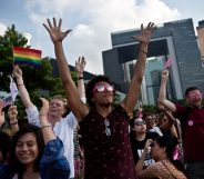 People dance as they attend a 'Pink Dot' event in Hong Kong on September 20, 2015. The LGBTI (lesbian, gay, bisexual, transgender/transsexual and intersex) event in its second year celebrated diversity under the theme "Love Is Love" and attracted some 15,000 visitors. AFP PHOTO / DALE DE LA REY (Photo credit should read DALE de la REY/AFP/Getty Images)