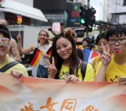 People take part in the Lesbian, Gay, Bi-sexual and Transgender (LGBT) parade in Hong Kong on November 6, 2015. Hong Kong's streets were coloured by rainbow flags as protesters marched in the city's annual gay pride parade to call for equality and same-sex marriage. AFP PHOTO / ISAAC LAWRENCE (Photo credit should read Isaac Lawrence/AFP/Getty Images)