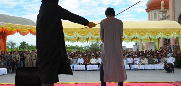 Indonesian men facing lashes