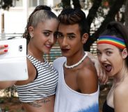 Participants use a phone to take a selfie at the opening event of the annual Gay Pride parade in the Israeli city of Tel Aviv, on June 3, 2016. A carefree and cosmopolitan crowd of tens of thousands of homosexuals, transsexuals and supporters took part it the Gay Pride in Tel Aviv, deemed one of the largest in the world where amid the crowd, tourists waved large flags of their country of origin to signify their presence in a city known as a rare oasis for LGBT (lesbian, gay, bi-sexual and transgender) in the Middle East. / AFP / JACK GUEZ (Photo credit should read JACK GUEZ/AFP/Getty Images)