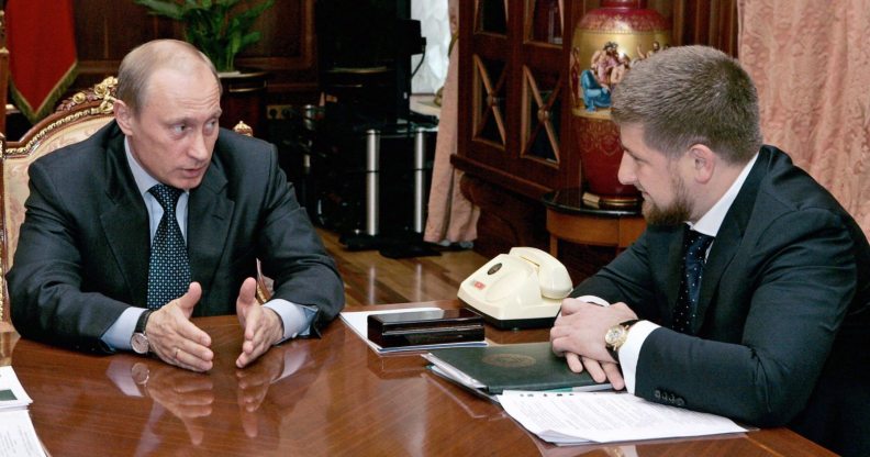 ST.PETERSBURG, RUSSIAN FEDERATION: Russian President Vladimir Putin (L) speaks to Chechen Prime Minister Ramzan Kadyrov during their meeting at the Kremlin in Moscow, 05 May 2006. The pro-Russian prime minister of Chechnya, Ramzan Kadyrov, said 02 May that his militia, accused of conducting a reign of terror, was being reassigned and placed under Russian command. "The structures no longer exist," the Itar-Tass news agency cited Kadyrov as saying about transferring responsibility for the militia which until now was part of the Chechen anti-terrorist unit. AFP PHOTO / ITAR-TASS / PRESIDENTIAL PRESS SERVICE (Photo credit should read SERGEI ZHUKOV/AFP/Getty Images)