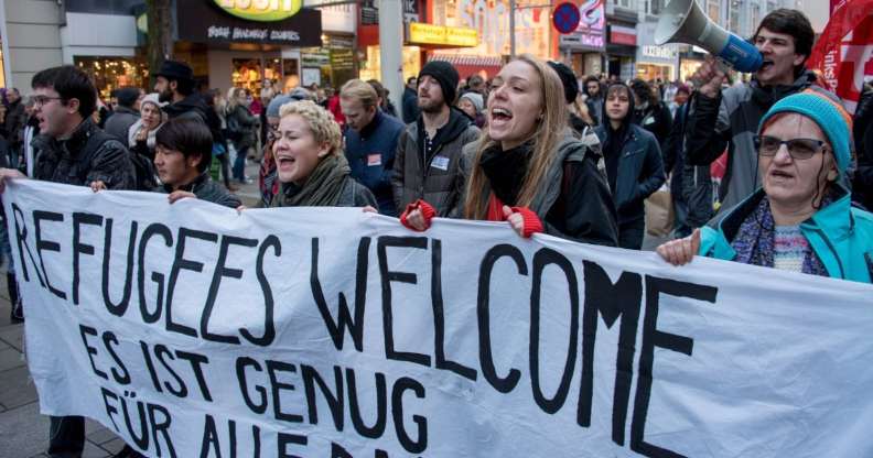 Austrian citizens and asylum seekers march during a pro-refugee protest called "Let them stay" in Vienna, Austria on November 26, 2016. Austria will hold the postponed second round of the presidential elections on December 4, 2016. / AFP / JOE KLAMAR (Photo credit should read JOE KLAMAR/AFP/Getty Images)