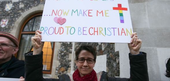 a protester outside the church of england general synod