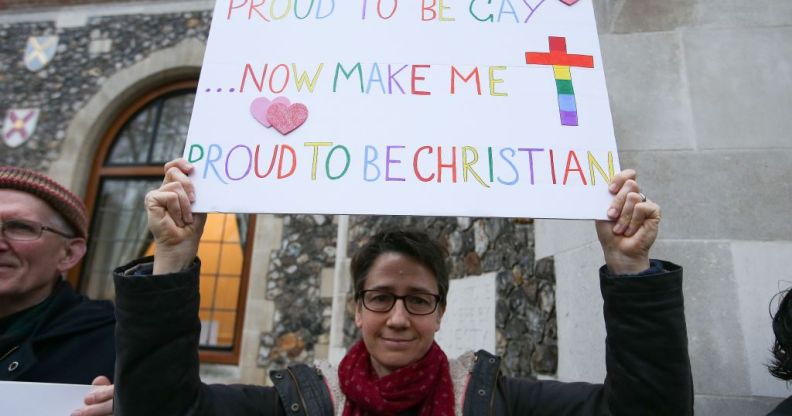 a protester outside the church of england general synod