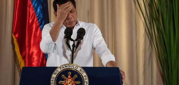 Philippine President Rodrigo Duterte gestures as he gives a speech during the mass oath taking of officials of various national leagues at the Malacanang Palace in Manila on June 1, 2017. Philippine airstrikes aimed at Islamist militants who are holding hostages as human shields in a southern city killed 11 soldiers, authorities said on June 1, as they conceded hundreds of gunmen may have escaped a blockade. / AFP PHOTO / NOEL CELIS (Photo credit should read NOEL CELIS/AFP/Getty Images)